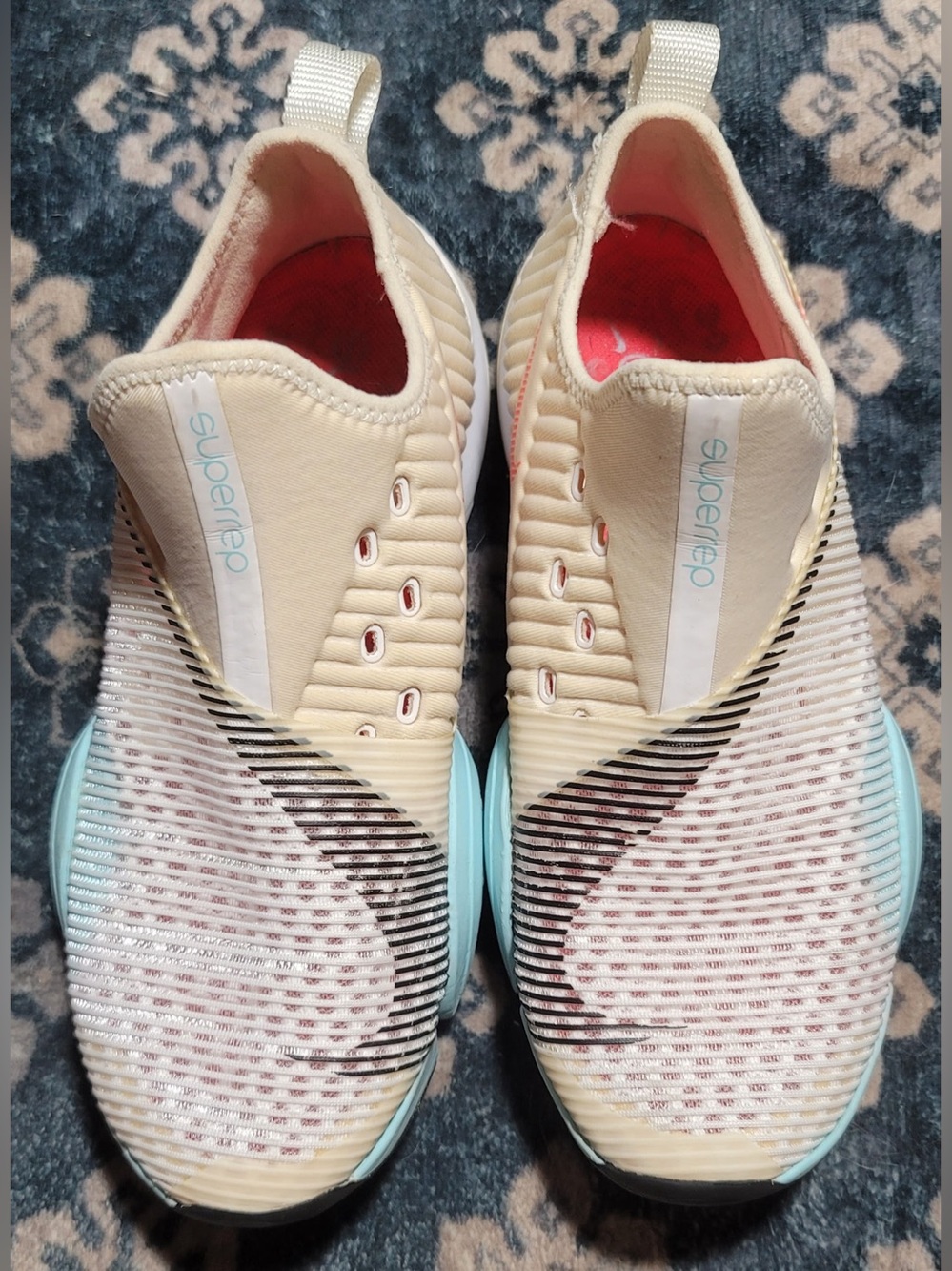 Nike Women’s Slip-On Athletic Shoes in Cream and Light Blue